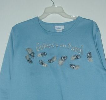CCM0002_guinea_fowl_feather_shirt_dee_1.jpg